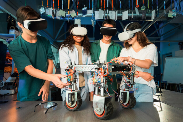 High School Students exploring modern science curriculum with VR technology.